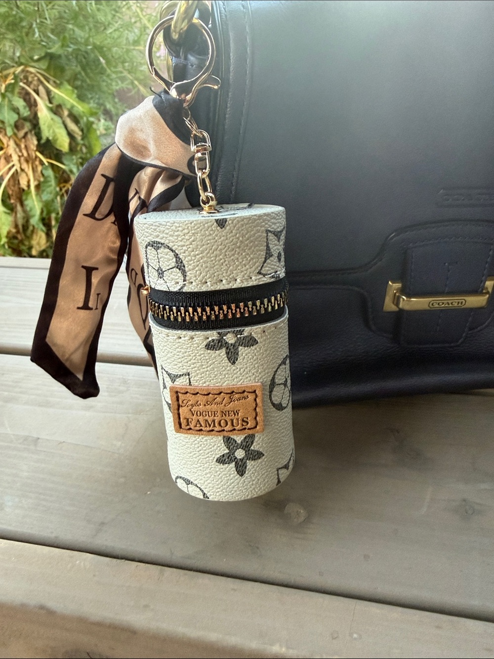 Vogue Ivory and Black Monogram Cylinder Keychain Pouch - Picture 1 of 7